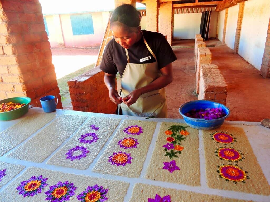 Lady making flower paper